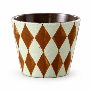 Diamond-pattern handleless ceramic coffee cup on a white background, with pale mint glaze and rust-brown diamonds.
