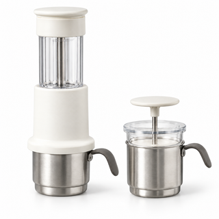 Cafetera espresso manual blanca con taza de acero inoxidable y espumador de leche manual a juego