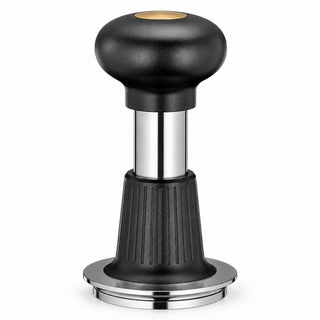 Black and gold self-leveling espresso tamper standing on a white background