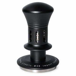 Black spring-loaded espresso tamper with slotted body and stainless steel base on white