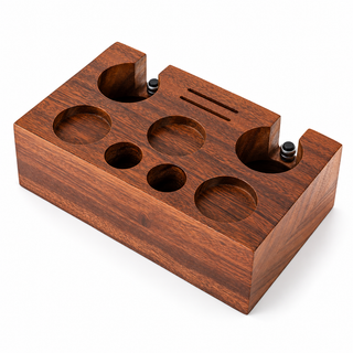 Solid walnut espresso tamping station with two adjustable portafilter supports on a white background