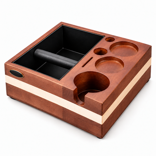 Large solid wood espresso tamping station with a cream inlay stripe, black knock bin and tool recesses on white.
