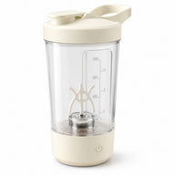 Cream 450 ml automatic stirring cup with clear body and flip-top lid on a white background