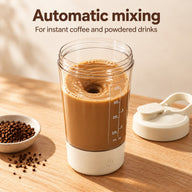 Automatic stirring cup mixing instant coffee with the lid removed