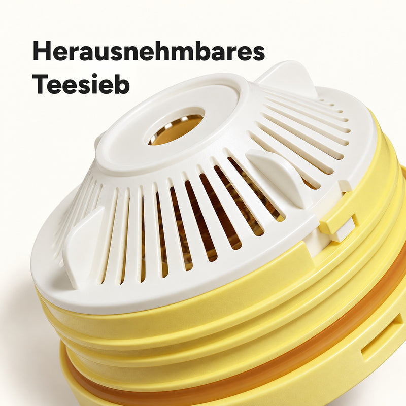 Nahaufnahme des herausnehmbaren weißen Teesiebs unter dem gelben Deckel