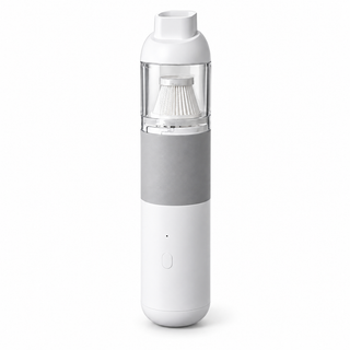 White and gray USB-C coffee grounds vacuum with transparent dust chamber on a white background