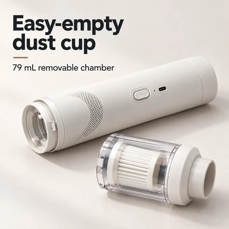 Removable 79 mL dust cup with pleated filter beside the white vacuum motor body