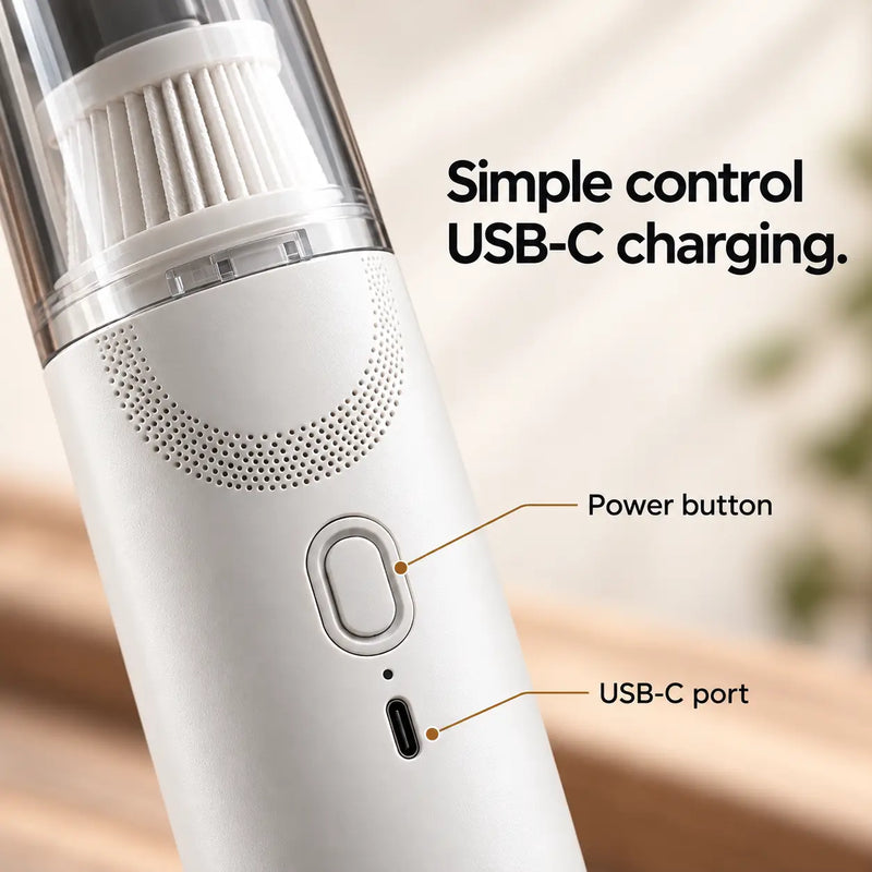 White coffee vacuum detail showing oval power button and USB-C charging port