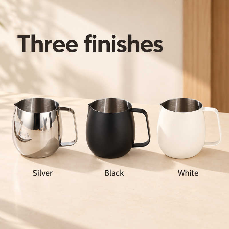 Egg-shaped milk frothing pitchers shown in silver, black and white finishes