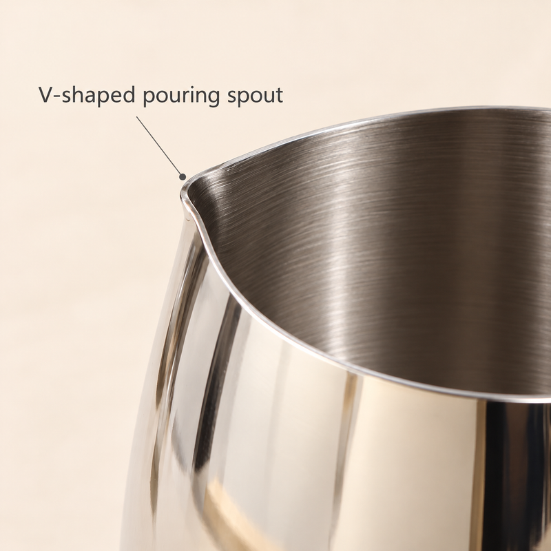 Close-up of the V-shaped pouring spout and brushed stainless steel interior