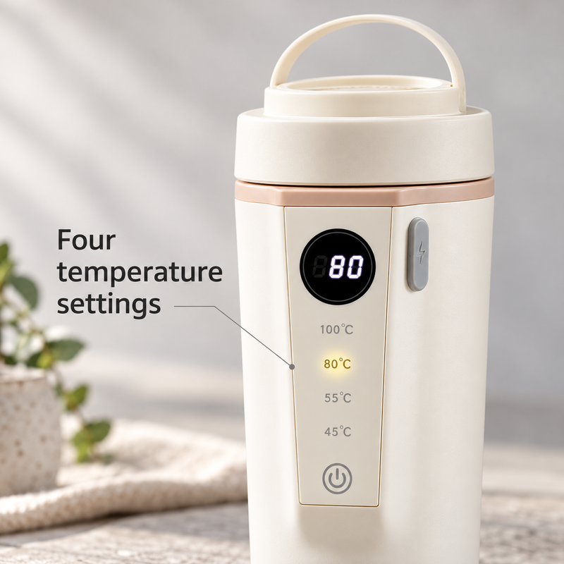 Close-up of the round display and four temperature settings on the ivory kettle