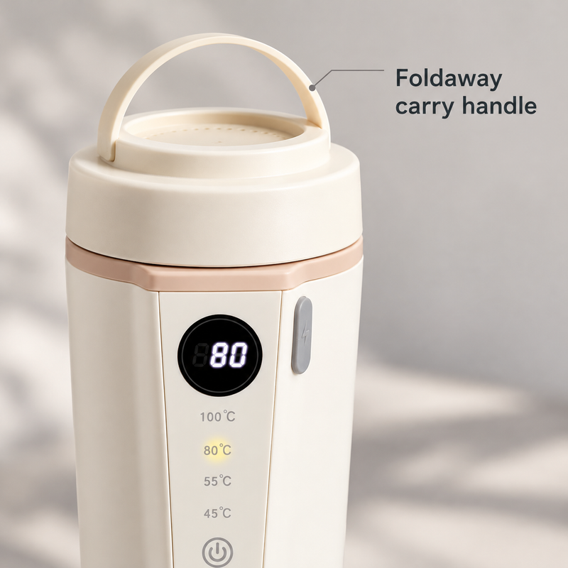 Close-up of the raised foldaway carry handle on the ivory kettle lid