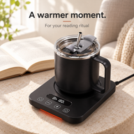 Black mug and warmer set on a side table beside an open book