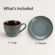 One blue-gray ceramic coffee cup and one matching saucer displayed separately