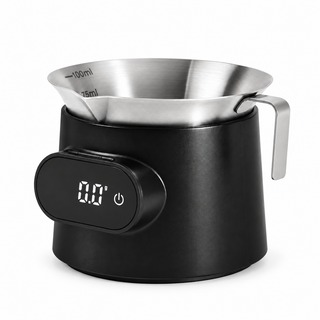 Black espresso cup scale with a removable silver stainless steel measuring cup on a white background