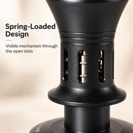 Close-up of the internal spring visible through the coffee tamper body slots