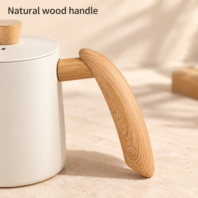 Close-up of the ivory gooseneck kettle's natural wood handle and upper attachment.