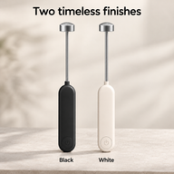 Black and ivory rechargeable handheld milk frothers shown side by side