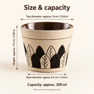 Afmetingen van de kop Ivoren bladeren: diameter boven ca. 9 cm, hoogte 7,5 cm, diameter voet 6,5 cm en inhoud 300 ml, met inch-equivalenten.