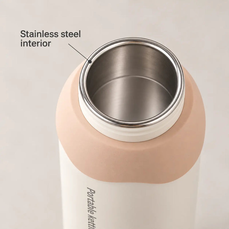 Close-up of the portable kettle's stainless steel interior and open rim