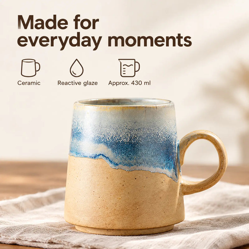 Ceramic coffee mug with reactive glaze and approximate 430 ml capacity labels
