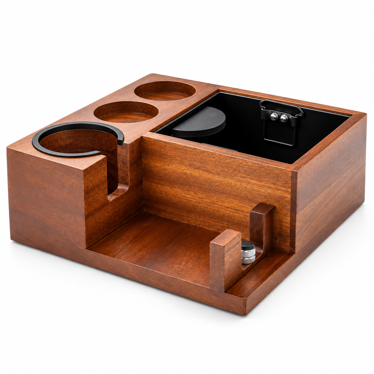 Sapele wood espresso tamping station with empty knock bin, two tool recesses and adjustable handle support on a white background.