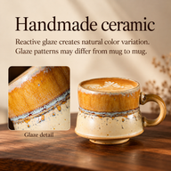 Small amber and ivory ceramic mug with a close-up of its naturally varied reactive glaze