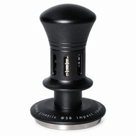 Black spring-loaded espresso tamper with slotted body and stainless steel base on white