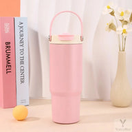 Pink Yozcoffee 750ml tumbler with folding carry handle and closed dual-drink lid
