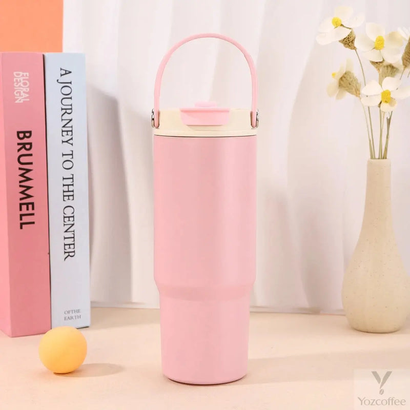 Pink Yozcoffee 750ml tumbler with folding carry handle and closed dual-drink lid