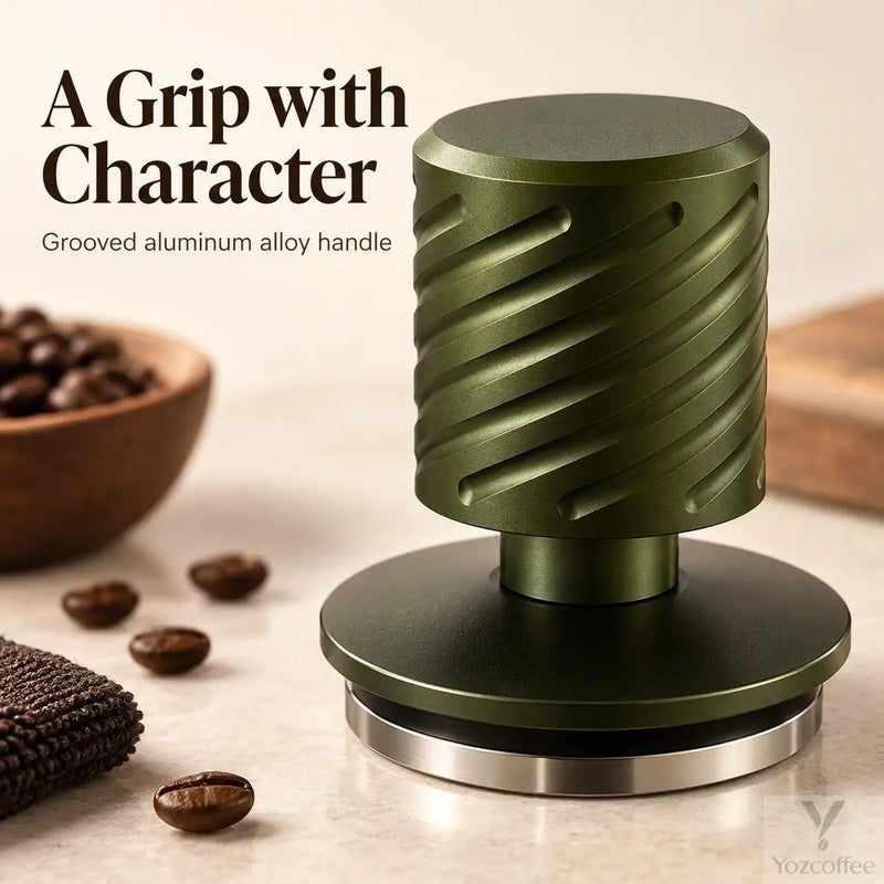 Close-up of the diagonal grooves on the dark olive green aluminum alloy tamper handle