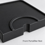 Portafilter rest detail on the black silicone tamping mat