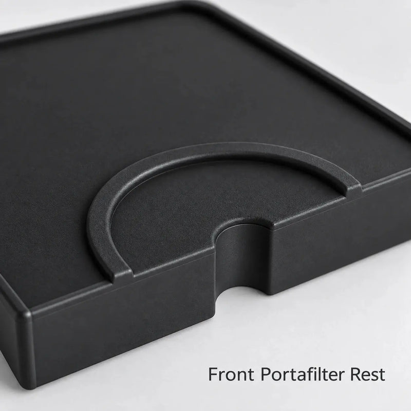 Portafilter rest detail on the black silicone tamping mat