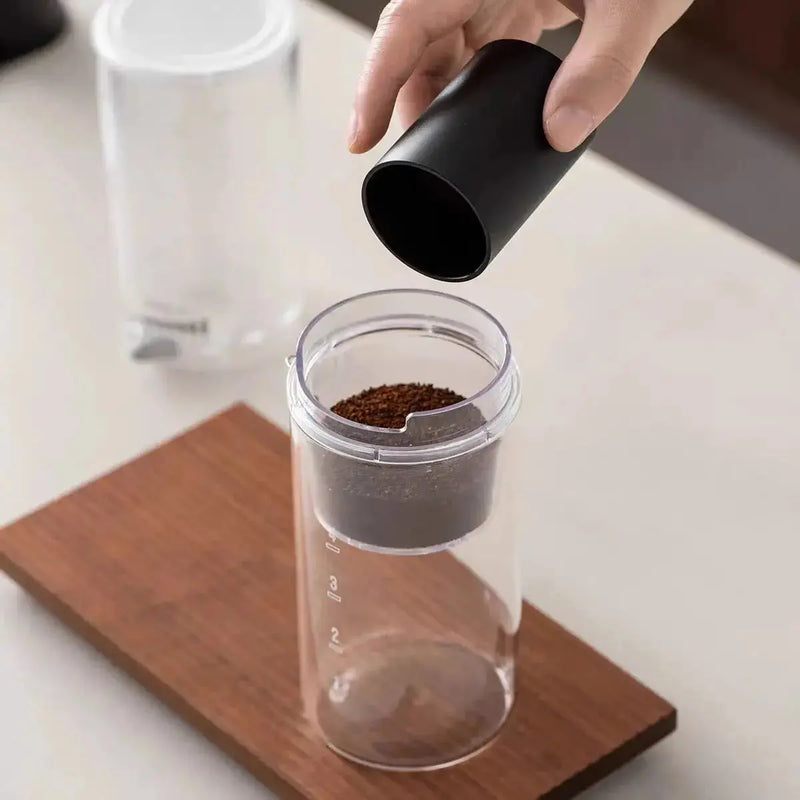 Slow-drip iced coffee maker with adjustable flow valve