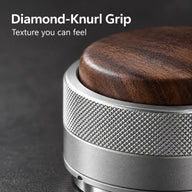Diamond-knurled grip and walnut cap detail on silver tamper