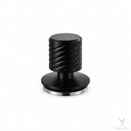 Yozcoffee matte black spring-loaded espresso tamper on white with grooved handle and silver stainless steel base
