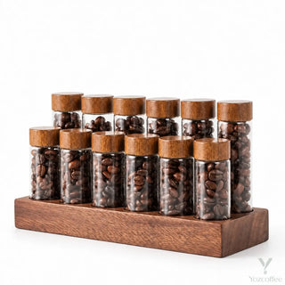 12 single-dose coffee bean tubes in a walnut base