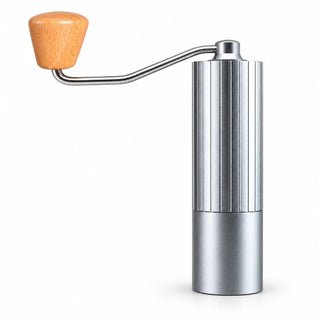 Silver manual coffee grinder with fluted aluminum body