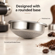 Side view showing the curved perforated base and polished rim of the silver espresso basket