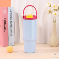Blue Yozcoffee 750ml tumbler with folding carry handle and closed dual-drink lid