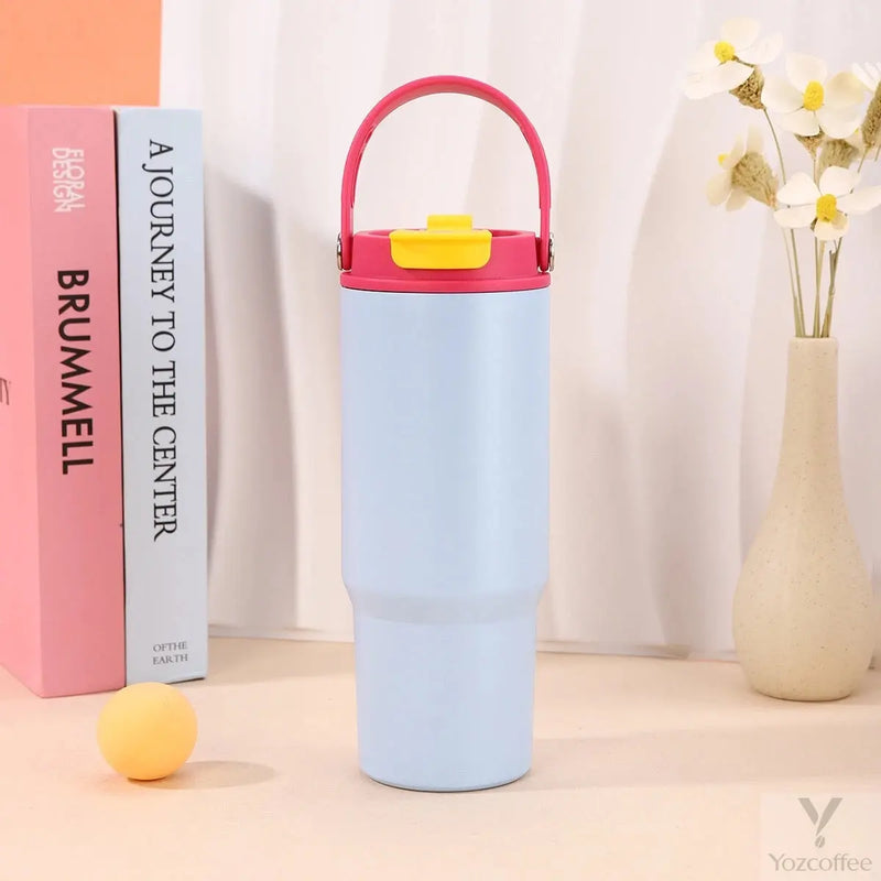 Blue Yozcoffee 750ml tumbler with folding carry handle and closed dual-drink lid
