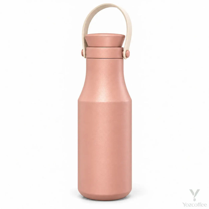 Peach Yozcoffee insulated stainless steel bottle with beige carry handle on white