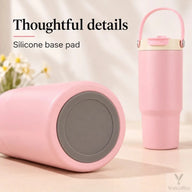 Close-up of the gray silicone base pad on the pink stainless steel tumbler