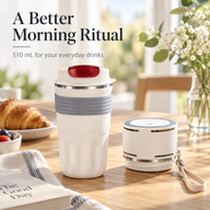 Ivory 510 mL travel mug with red flip drinking lid beside its detached temperature-control lid at breakfast