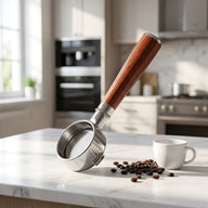 54mm bottomless portafilter with solid wood handle on a home coffee bar