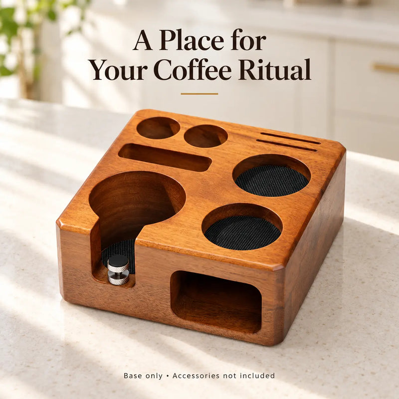 Empty wooden espresso tamping station on a sunlit kitchen counter