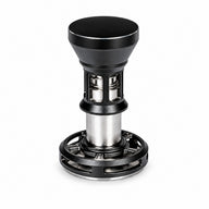 Black and silver 58mm mechanical impact espresso tamper on a white background