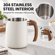 Cream-white 600 ml milk pitcher with brushed 304 stainless steel interior and faux wood-grain handle
