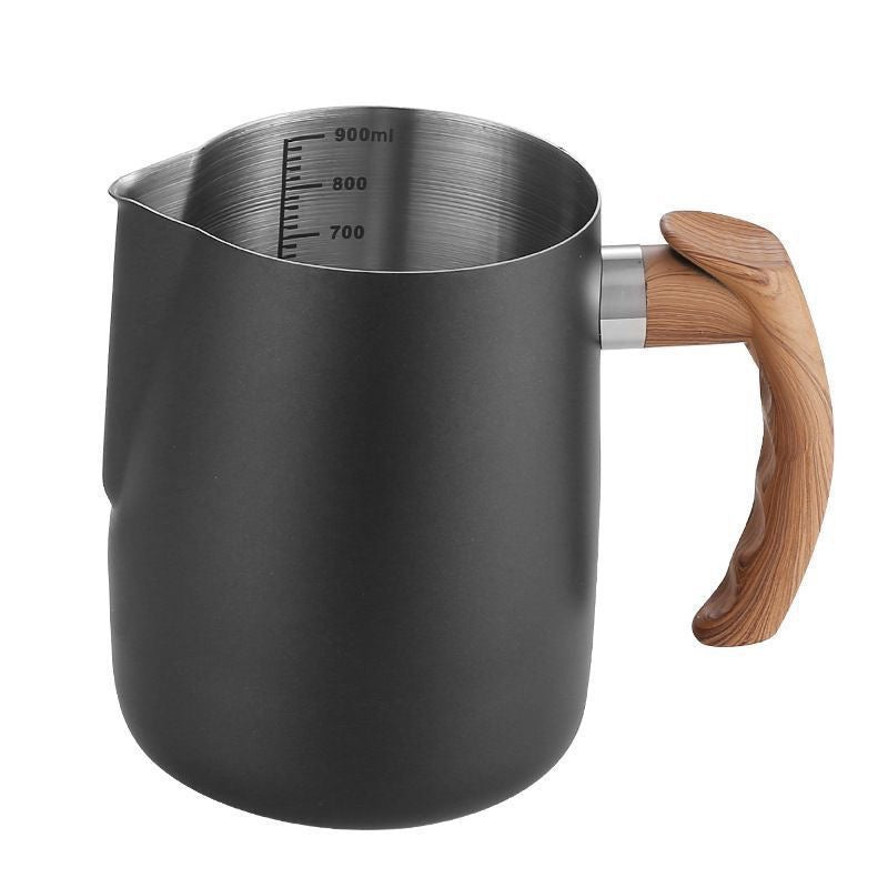 Black 600 ml stainless steel milk frothing pitcher with pointed spout and faux wood-grain handle