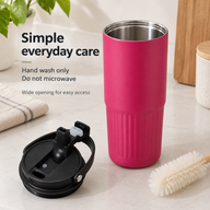 Open rose pink tumbler with a wide stainless steel opening and hand-wash care instructions